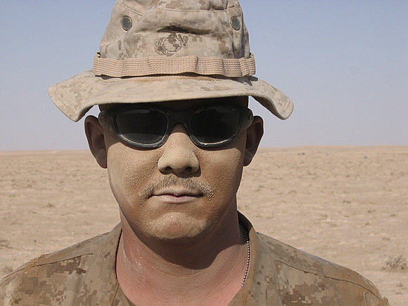 Corporal P covered in dust.