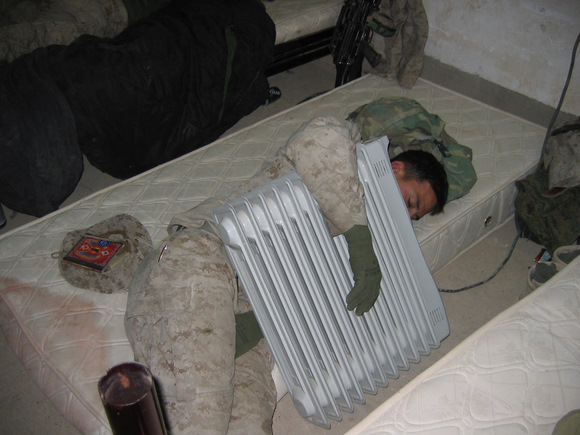Corporal A sleeping with a heater.